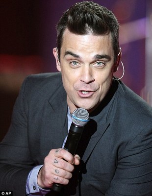 ug addict Robbie Williams launches poker site ug addict Robbie Williams launches poker site